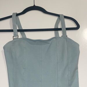 Very cute light blue h&m bodysuit with gold details on straps